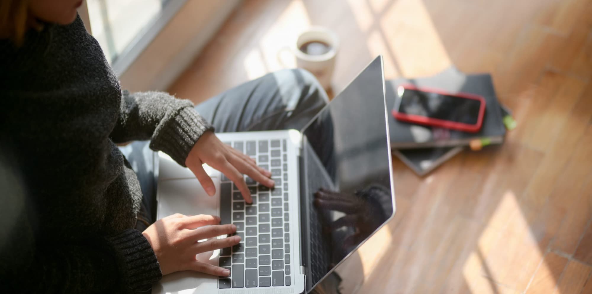 Professional working on a career search at a laptop
